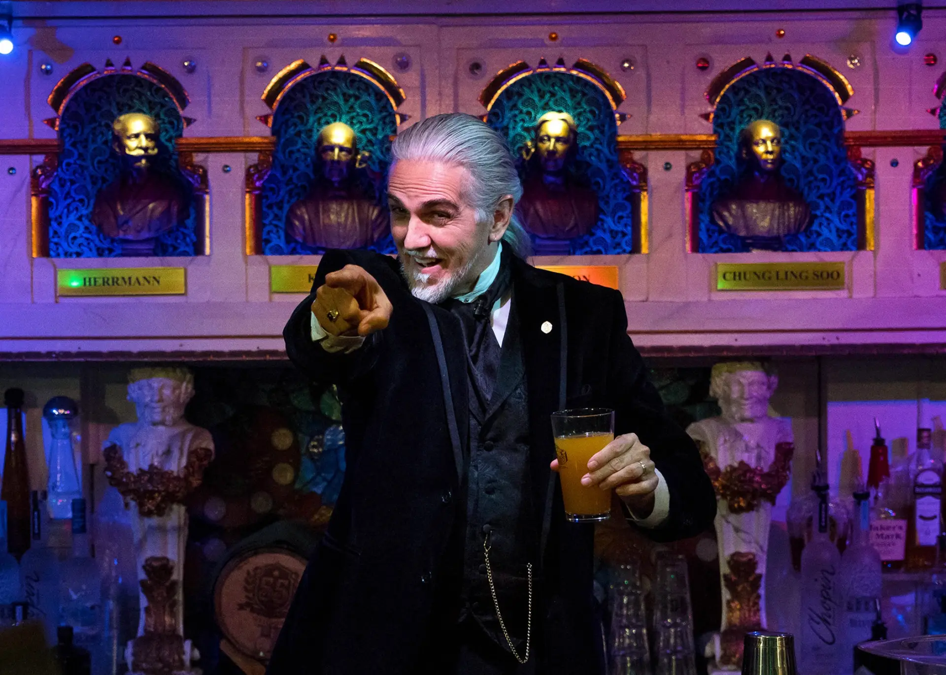 An animated Georges-Robert performs in the Library Bar at the Magic Castle